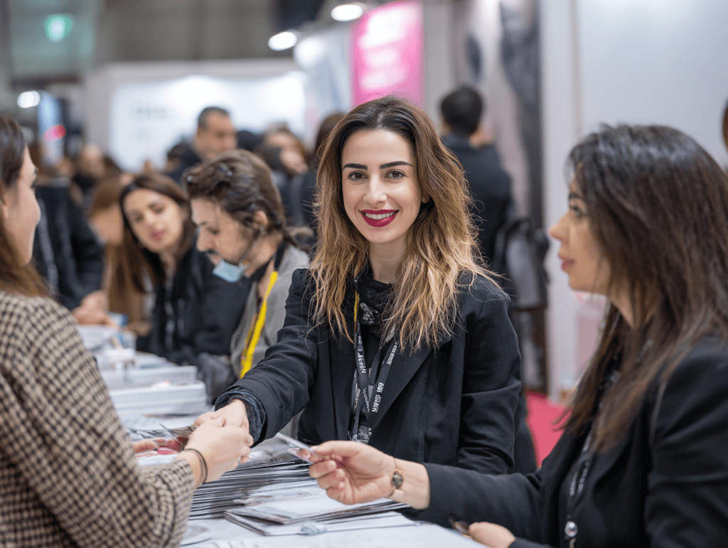 Networking at Istanbul Beauty Expo 2025 with global exhibitors and buyers connecting and discussing business.
